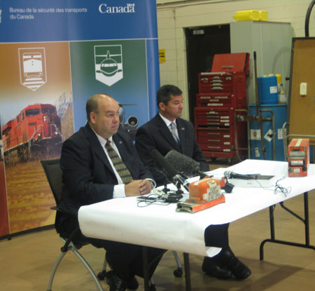Press briefing at the TSB Laboratory. From left to right : Mark Clitsome, Directior of Investigations (Air); Bryce Fisher, Manager, Standards and Performance (Air).