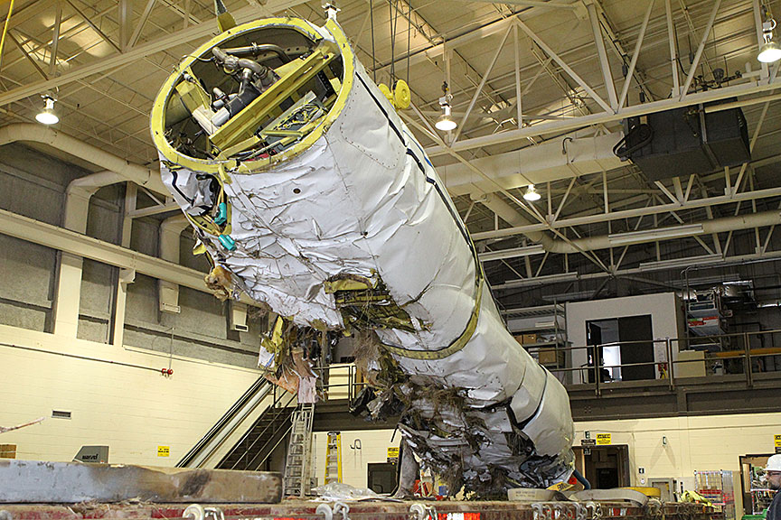 Image of the fuselage being removed from the truck