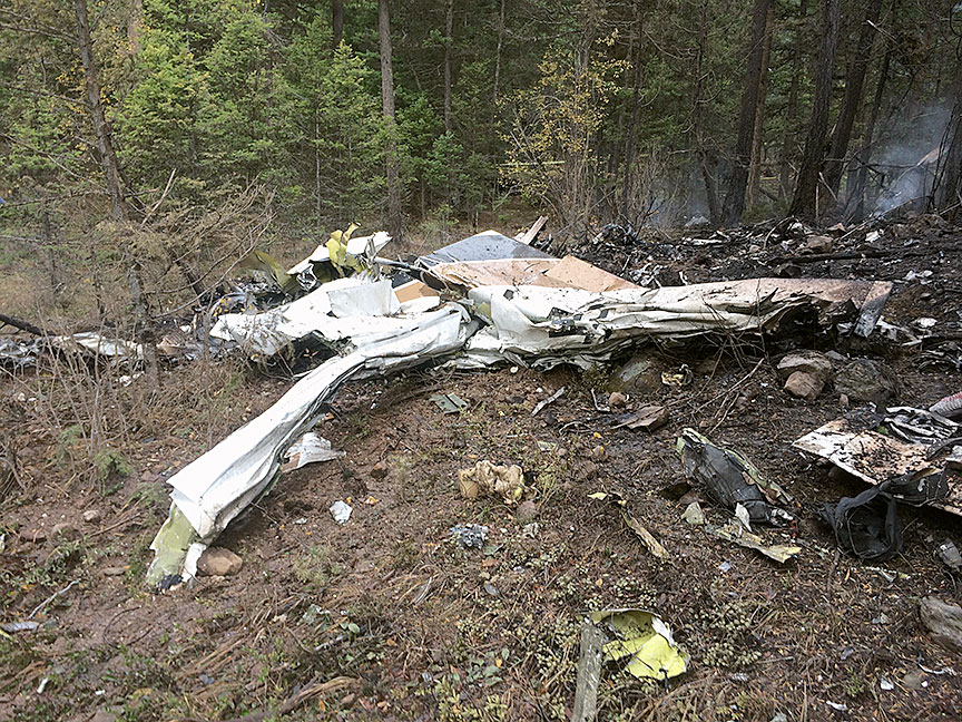 Overview of Cessna Citation wreckage showing fuselage and one of the wings