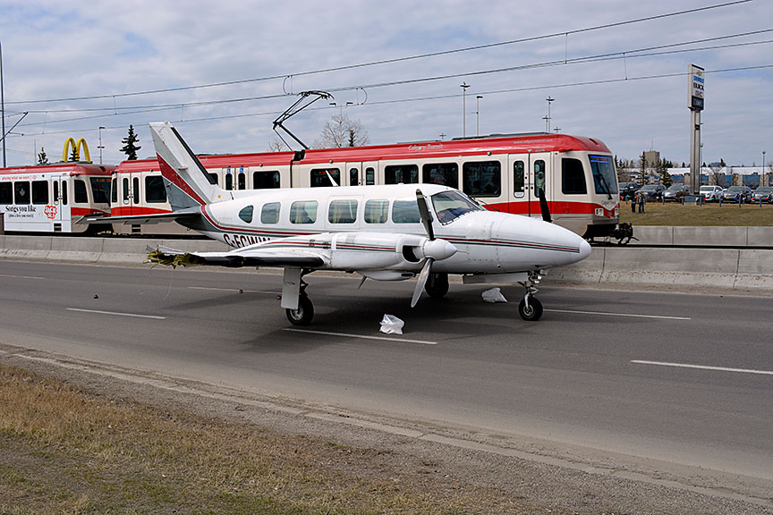 The Piper Navajo PA-31-350 after its forced landing onto 36th Street NE in Calgary, AB