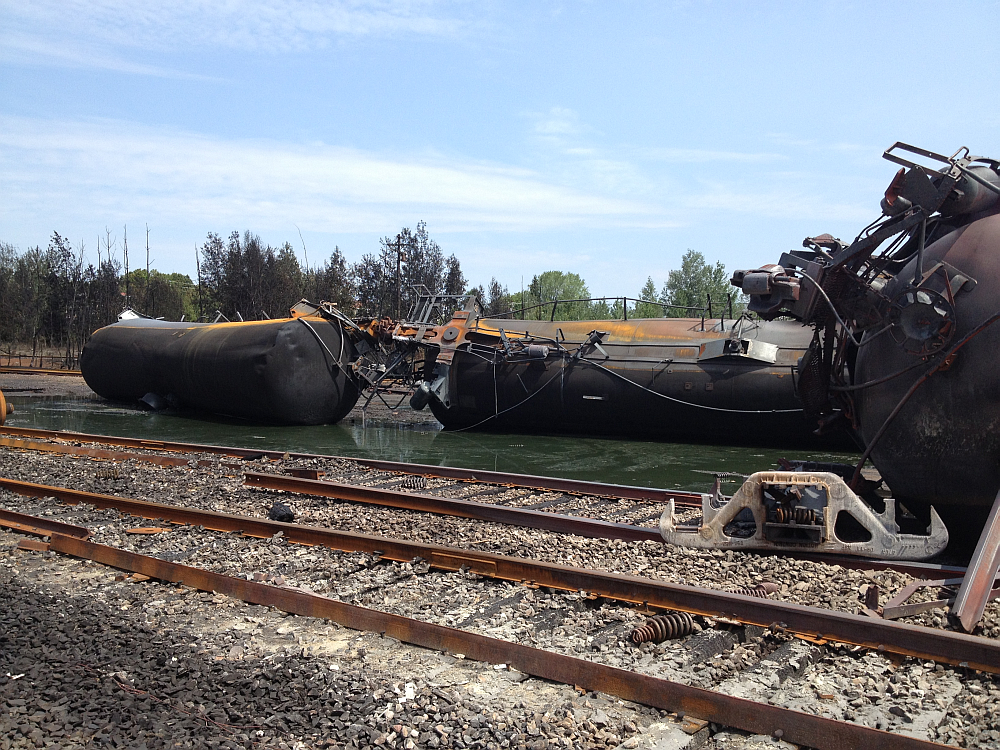 Tank cars lying on their side at Lac-Mégantic accident site