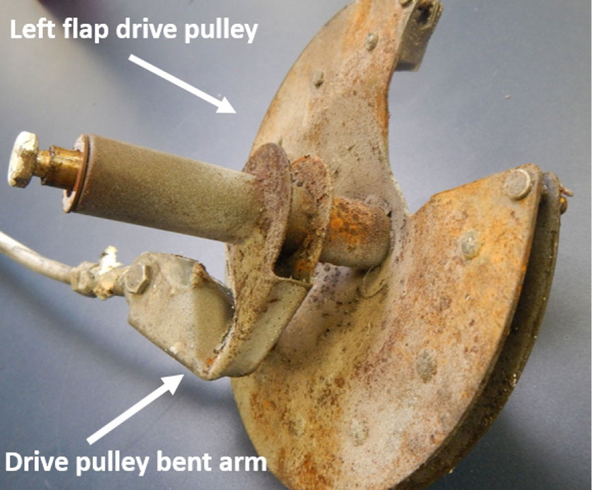 The left flap drive pulley