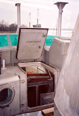 Photo 8 - A combined hinged hatch cover and door on the centreline at the after end of the wheelhouse