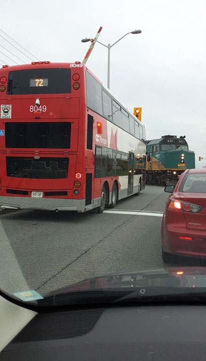 Image of a bus stopped past roadway stop line
