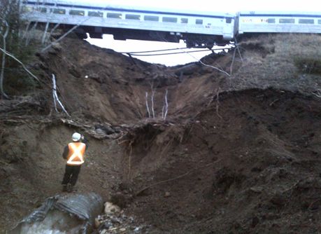 Photo showing ice blocking culvert outlet, as described above