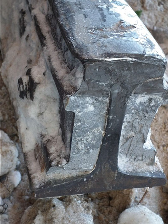 West portion of insulated joint assembly containing broken joint bars and intact rail recovered from the site