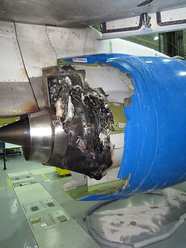 Left inboard thrust reverser cowl damage (Source: Bombardier Inc.)