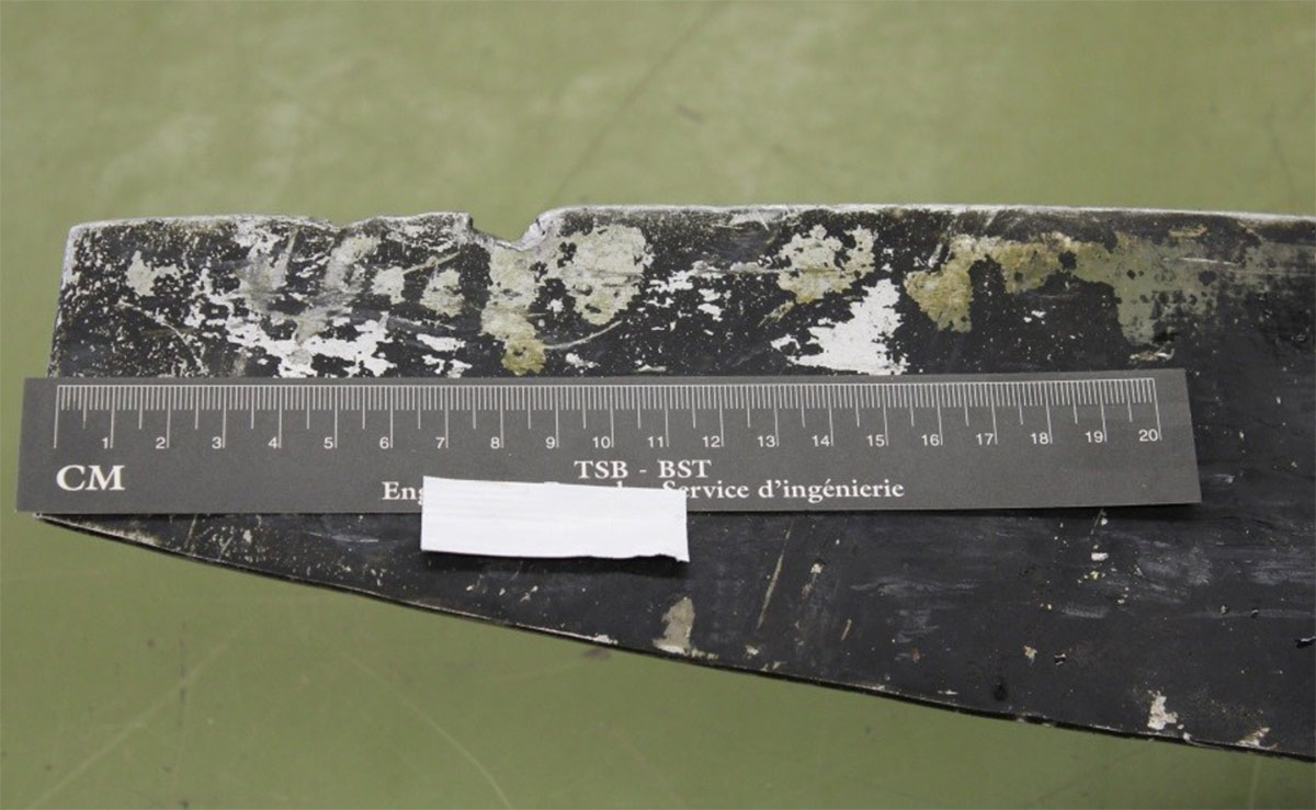 Impact dents on blade 1 of C-FGOI's propeller