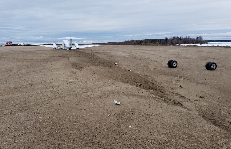 The occurrence aircraft near the threshold of Runway 23 (Source: Royal Canadian Mounted Police)