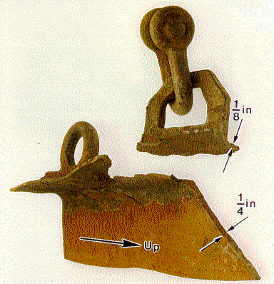 Fractured lug and structure from which it separated