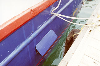 Photo of the main deck freeing port in hinged open position