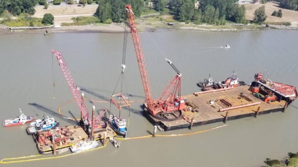 Crane barges lifting the <em>George H Ledcor</em> (Source: Canadian Coast Guard Environmental Response)