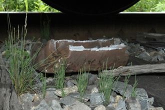 Photo of the broken locomotive knuckle segment found under the second locomotive