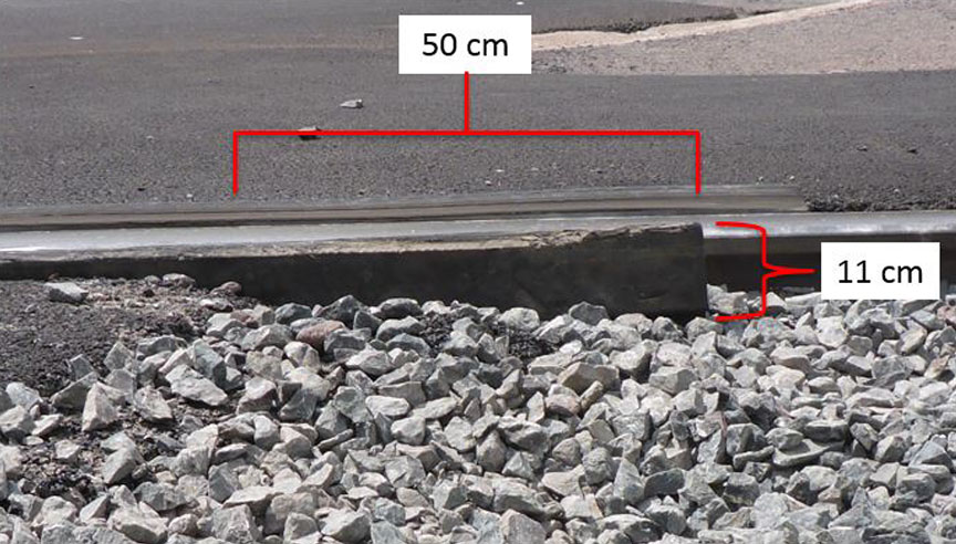 Eastern extremity of rubberized flangeway on the north rail