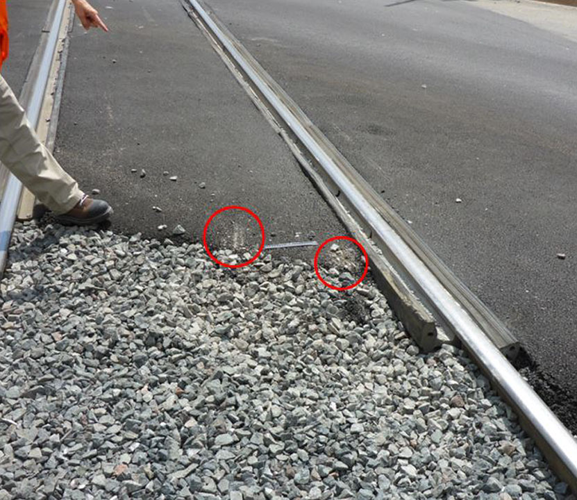 Gouge marks between the rails close to the north rubberized flangeway