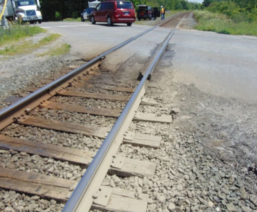 Mud contamination on the west side of the Carroll Street East crossing, looking east
