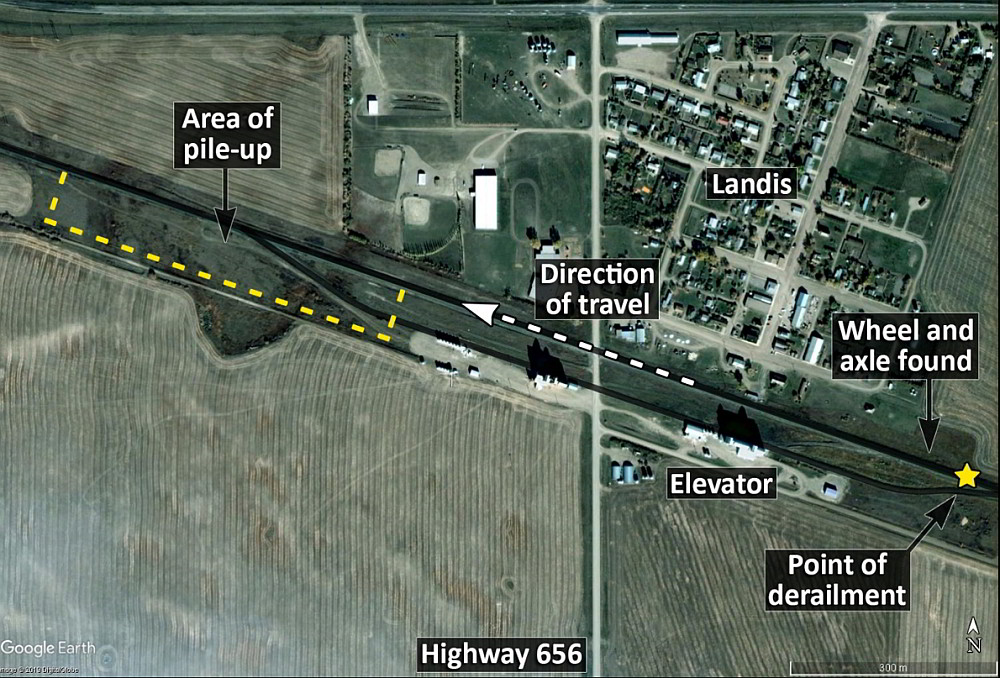  Point of derailment and main derailment pile-up (Source: Google  Earth, with TSB annotations)