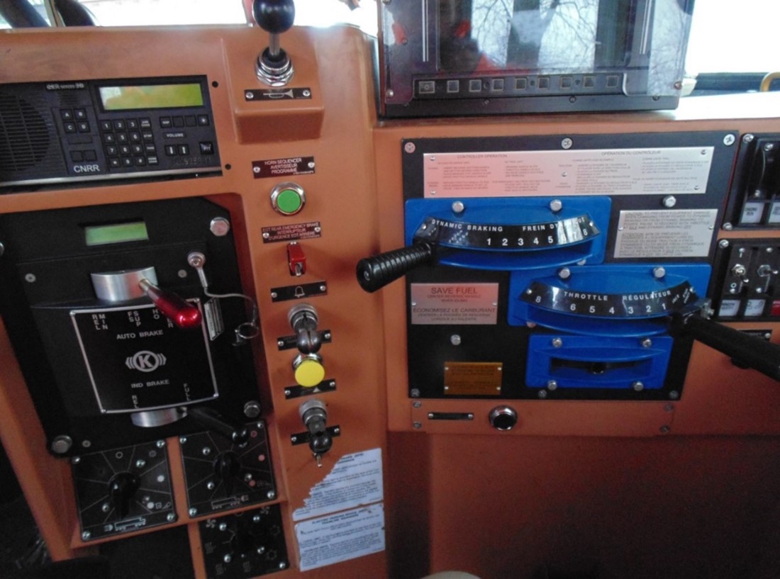 Typical General Electric model ET44AC locomotive control stand (Source: TSB)