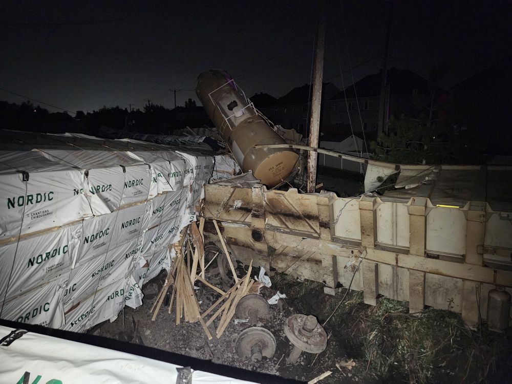 Photo 2. The CN freight train following the derailment on July 5, 2026 in Repentigny, Quebec (Source: Transportation Safety Board of Canada)